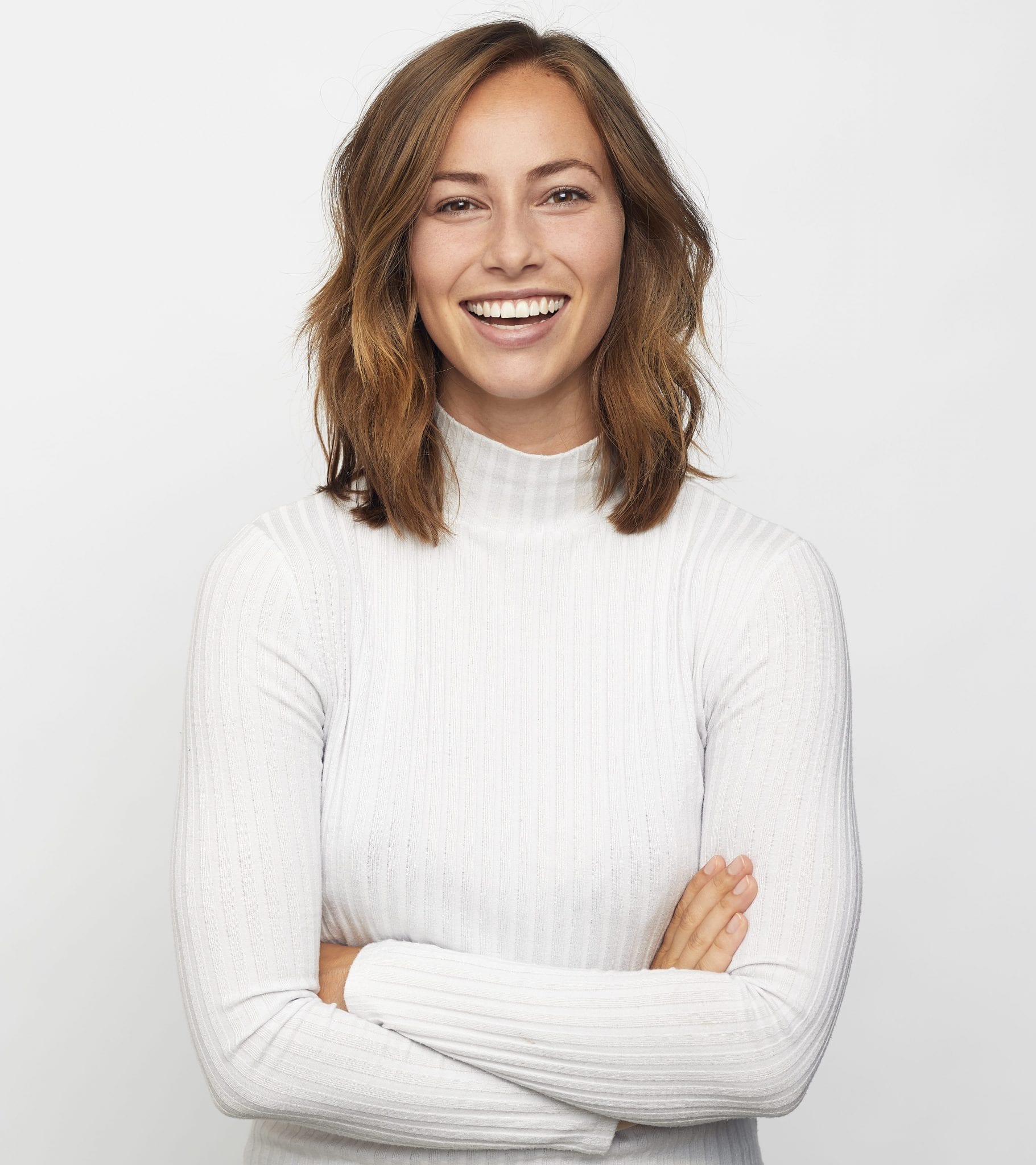 portrait of young happy woman looks in camera